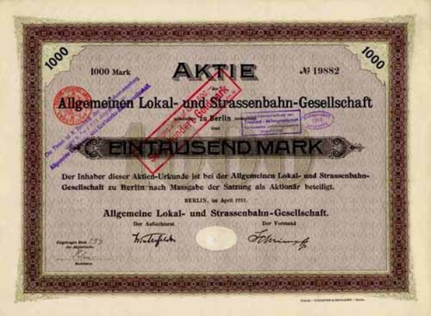 Alte deutsche Regierung ausgegebene Aktienzertifikat mit gedrucktem Text und numerischen Details.